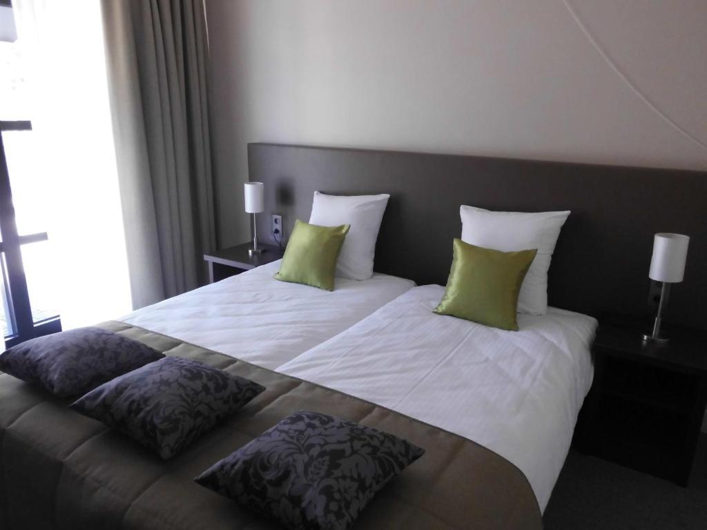 Hotel Boomgaard Lanaken Quarto foto